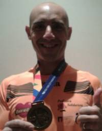 Danilo Osimani e la sua medaglia alla Maratona di New York